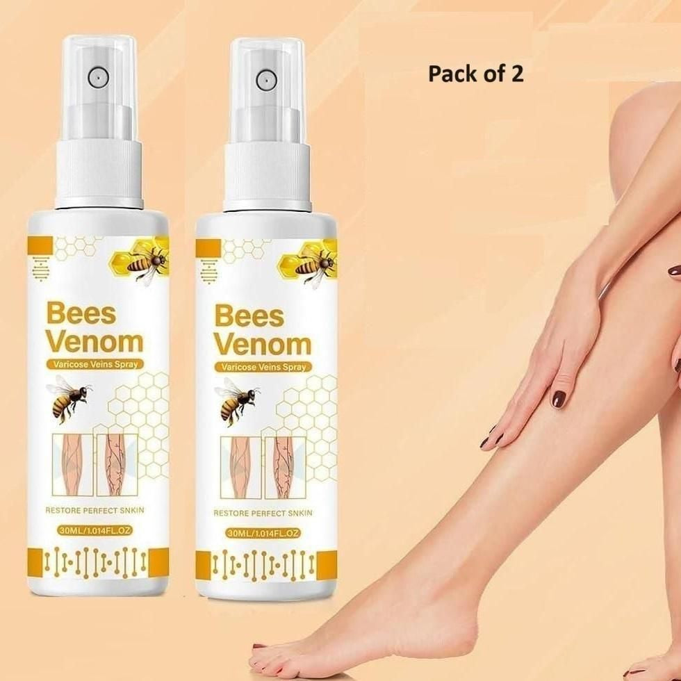 Two bottles of 'Bees Venom' hair removal spray with a person's legs and hand on a beige background.